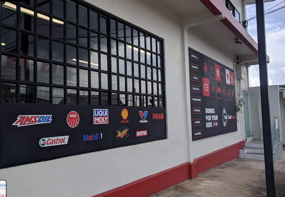 The Car Bar outside view with brand wall